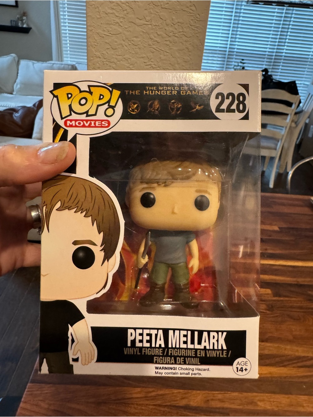 Funko Pop! Movies Peeta Mellark Vinyl Figure - Brown Hair, Green Outfit